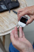 a person blood sugar testing using a gluco-meter