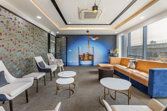 A vibrant commercial lounge area with bold colors, creative seating arrangements, and eye-catching decor elements.