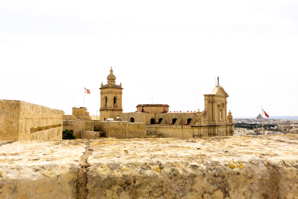 a large building with two towers on top of it