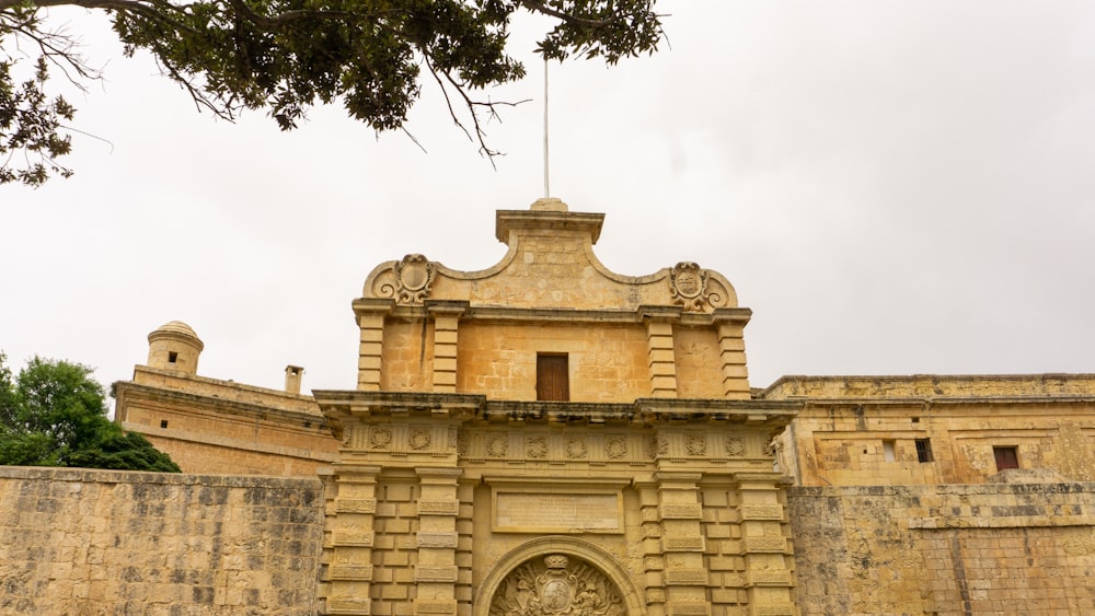 a large building with a clock on the front of it