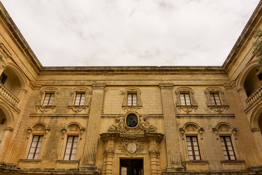 a large building with a clock on the front of it