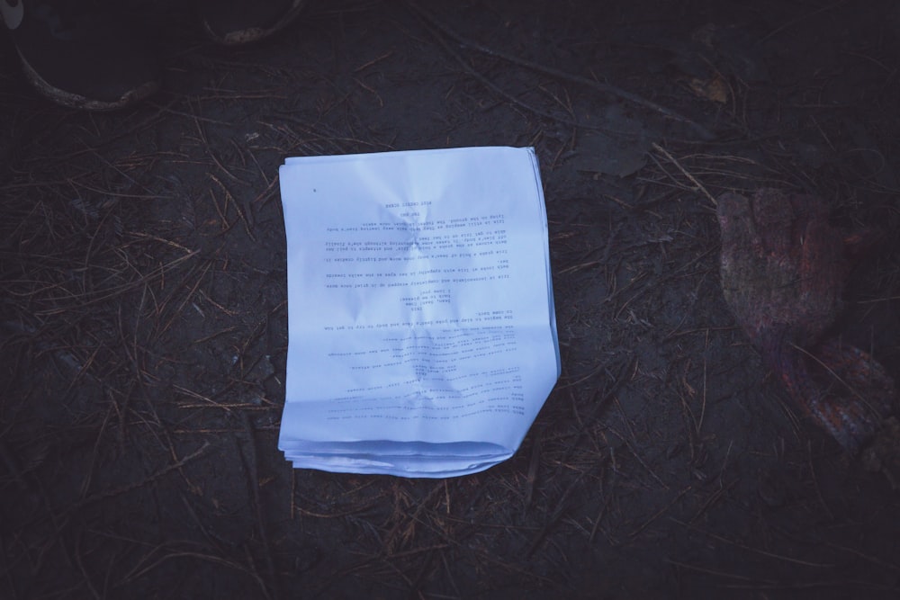 a piece of paper that is laying on the ground