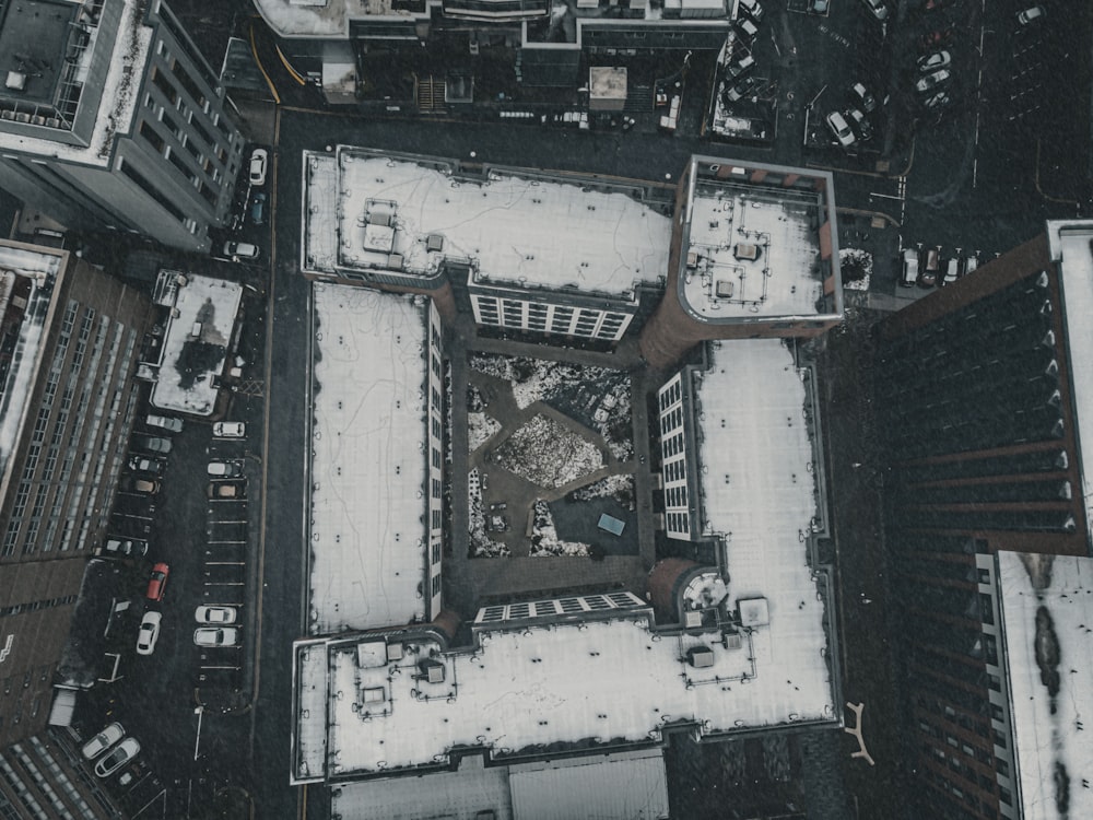 an aerial view of a snow covered city