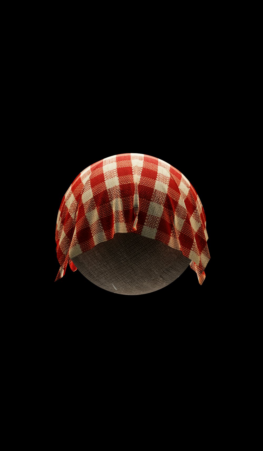 a red and white checkered hat hanging from a ceiling