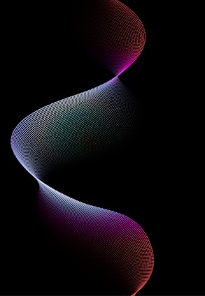 A dynamic, flowing wave composed of small, colorful dots against a black background. The wave moves in a fluid S-shape, with colors transitioning from vibrant purples at the top and bottom to softer blues and pinks in the center, creating a sense of depth and motion.