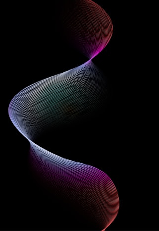 A dynamic, flowing wave composed of small, colorful dots against a black background. The wave moves in a fluid S-shape, with colors transitioning from vibrant purples at the top and bottom to softer blues and pinks in the center, creating a sense of depth and motion.