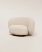 A minimalist club chair featuring light beige linen and wooden armrests.