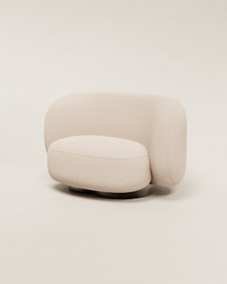 A comfortable armchair with soft cushions and a modern design.