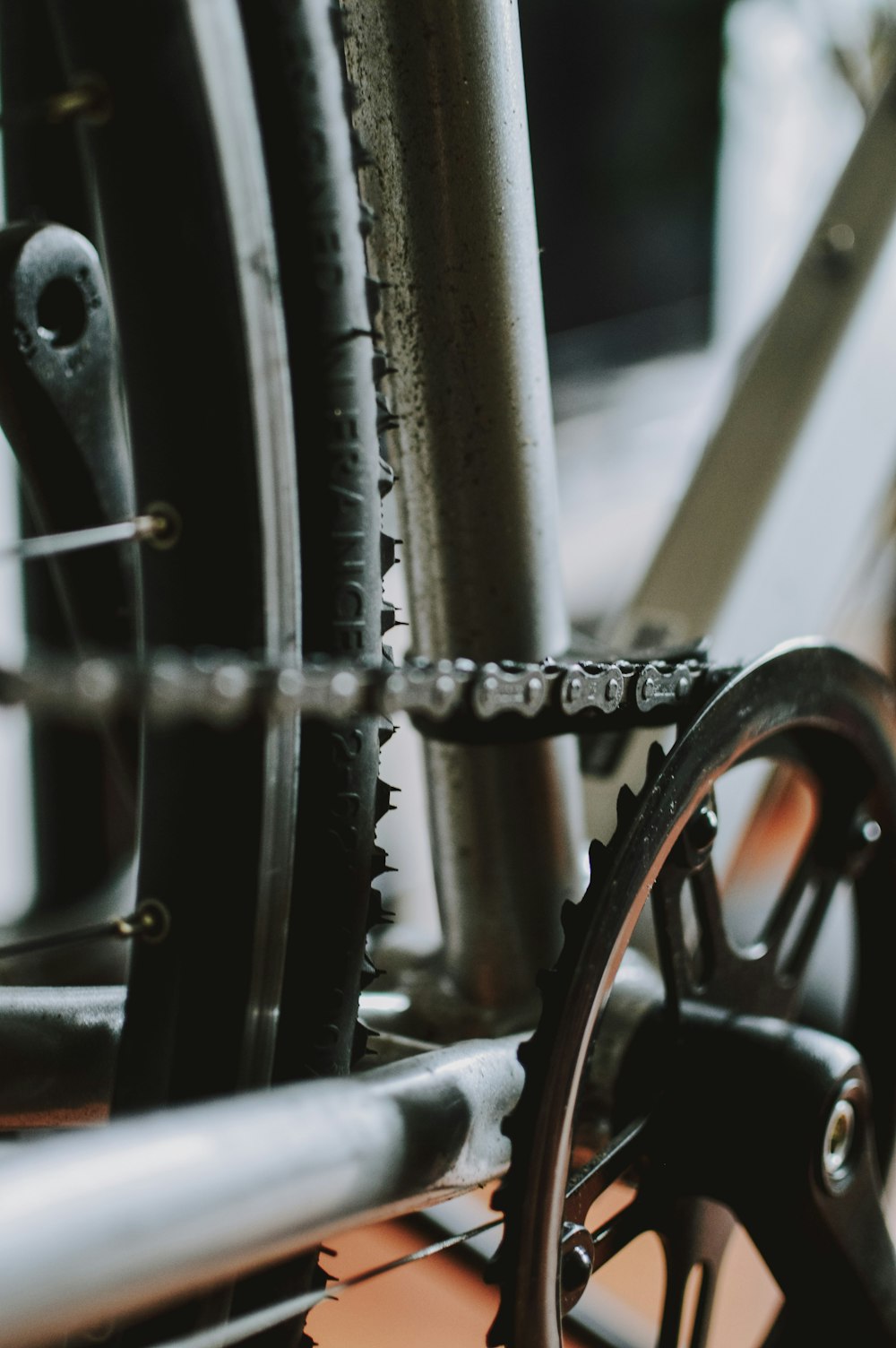 a close up of a bike's gears and chain