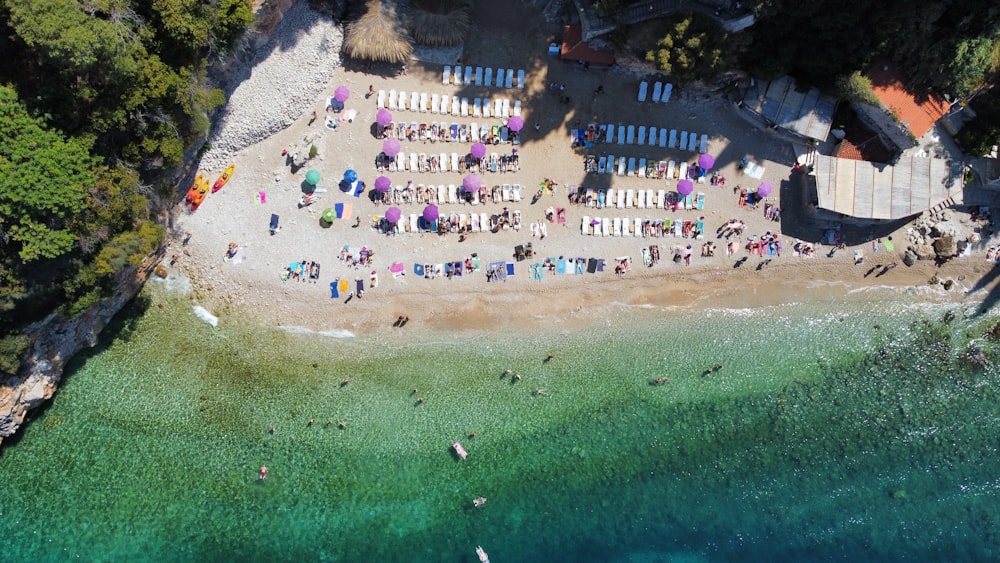 an aerial view of a beach with a lot of people