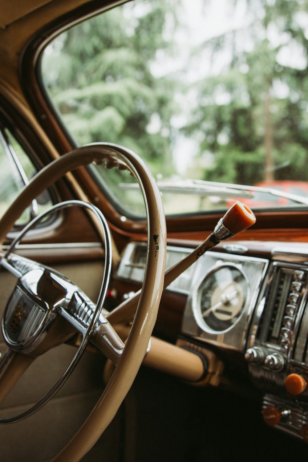 a steering wheel and dashboard of a car