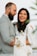 A happy couple celebrating their wedding with beautifully decorated venue.