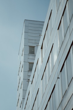 A sleek, modern building with clean lines reflecting contemporary real estate design.