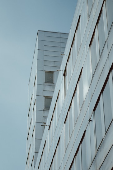 A sleek, modern building with clean lines reflecting contemporary real estate design.