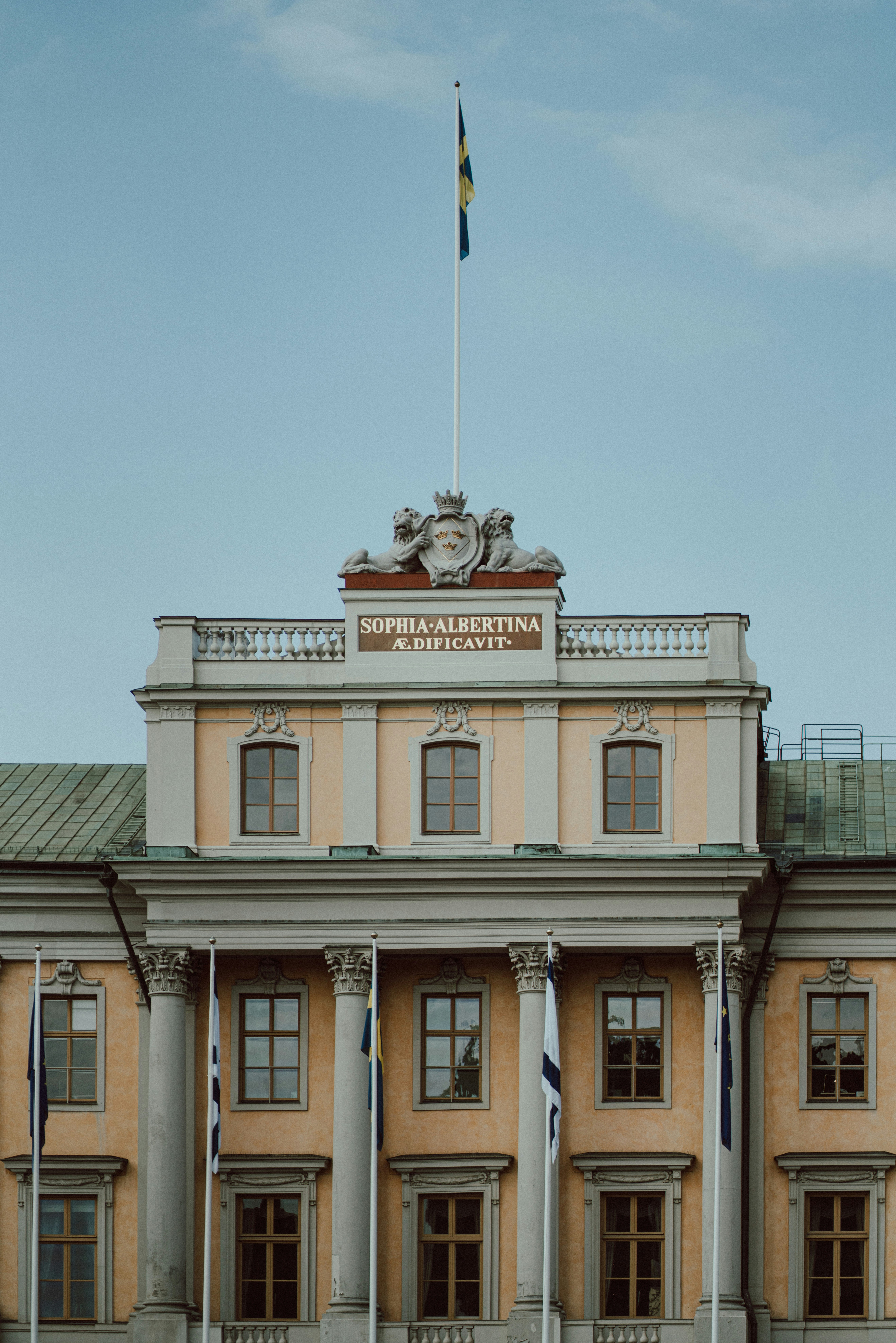a large building with a flag on top of it