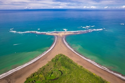 an aerial view of a beach and ocean