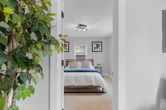 Cozy furnished bedroom representing a mid-term rental for traveling professionals
