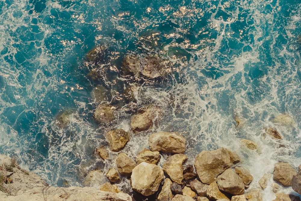 a view of rocks and water from above