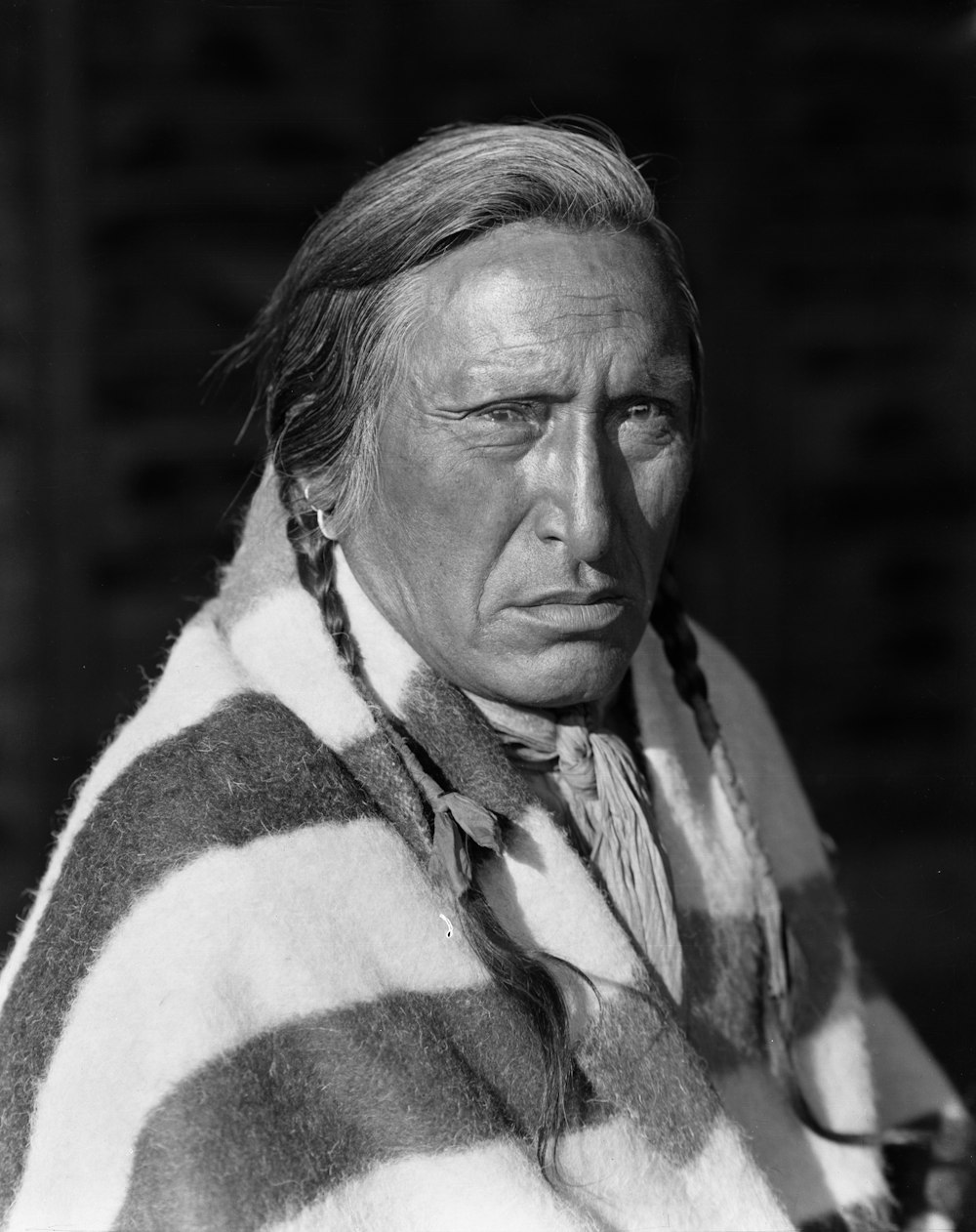 an old photo of a native american man