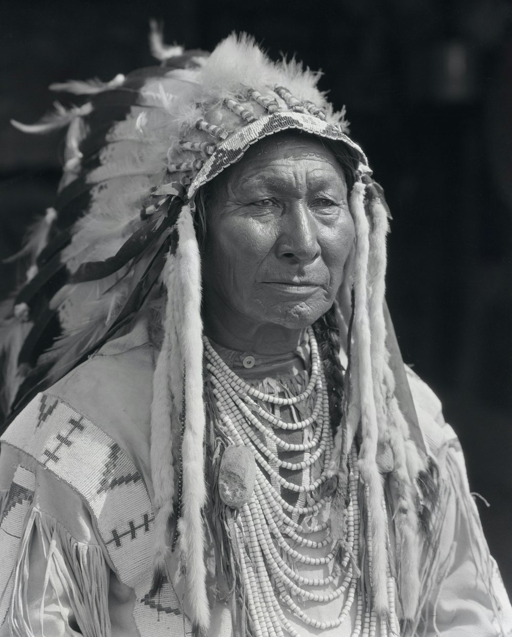 an old photo of a native american man