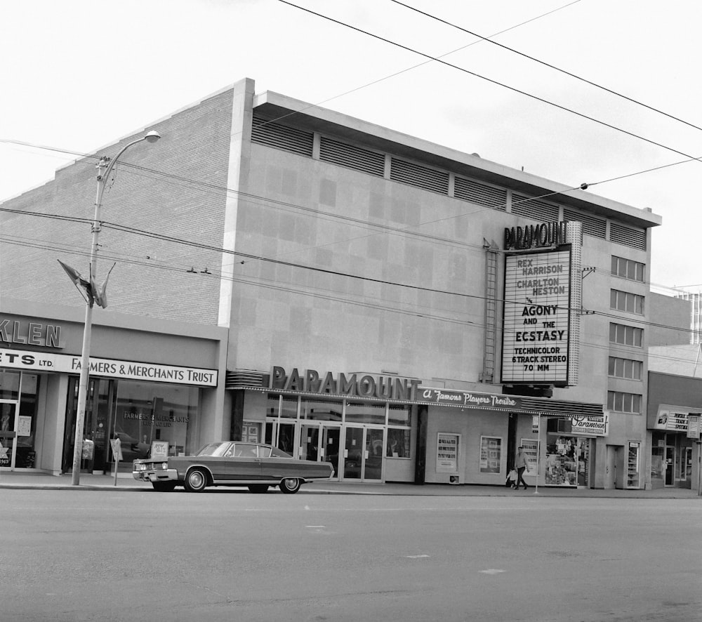 a black and white photo of a movie theater