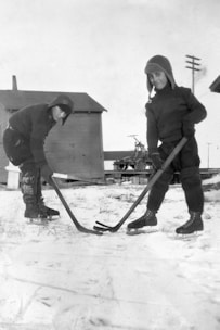 Children playing hockey on the ice rink, capturing the spirit of the Inkerman Rockets legacy.