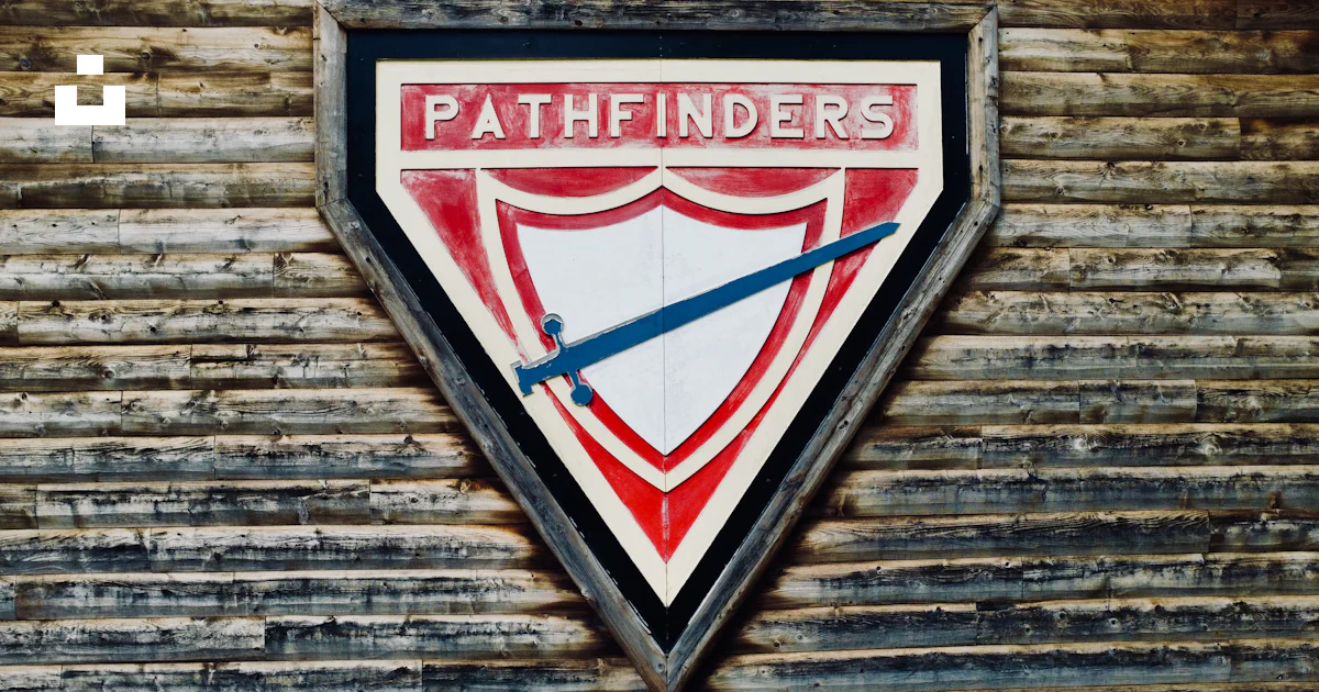 A sign on the side of a building that says pathfinders photo – Free ...