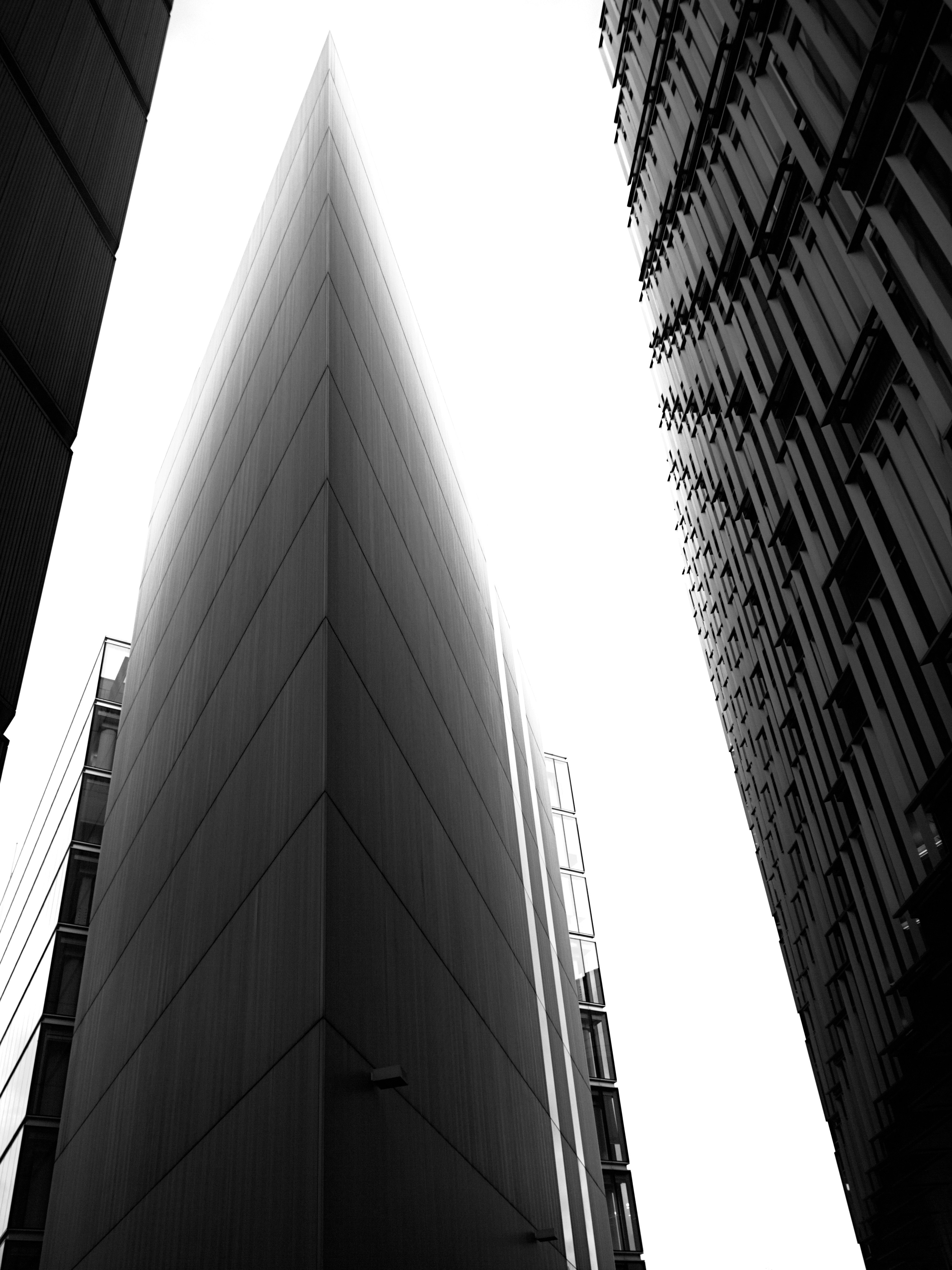 a black and white photo of a tall building