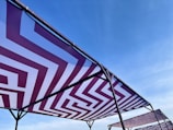 An installation process of a custom canopy at a residence.
