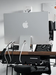 A sleek, modern workspace featuring Aivera's AI smart devices seamlessly integrated into daily life.