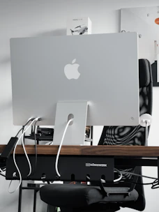 A sharp, modern workspace with aviation and AI project elements subtly integrated