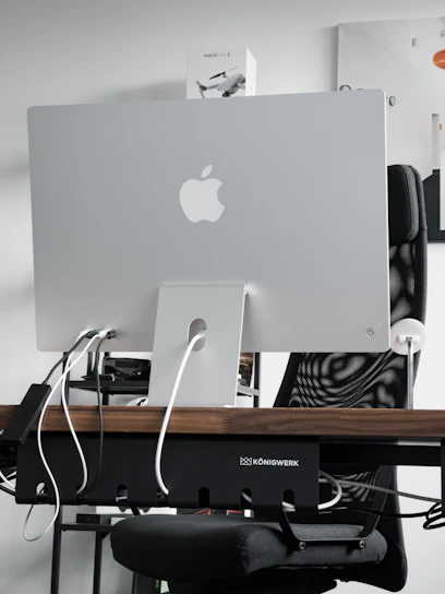 A sleek, modern workspace featuring Aivera's AI smart devices seamlessly integrated into daily life.