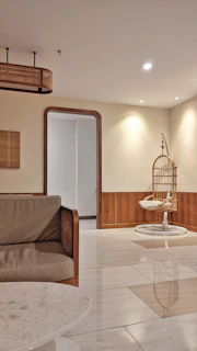 A styled living space featuring a mix of formalume’s geometric canvas and rattan decor