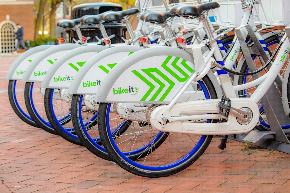 a row of bikes parked next to each other