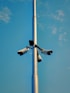 pole with four cameras attached to it