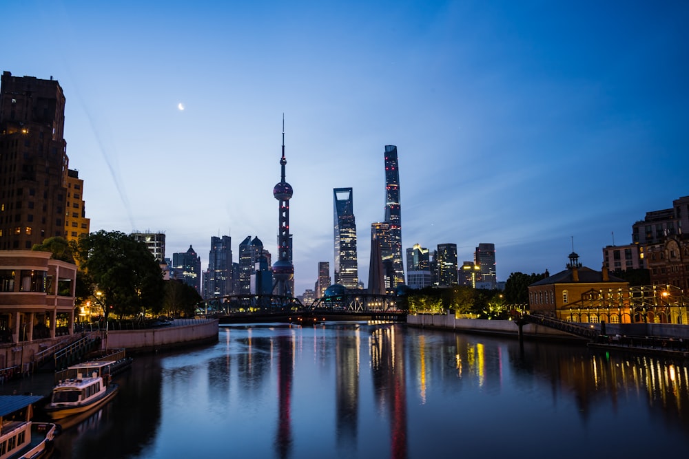 a body of water surrounded by tall buildings