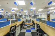 a room with a checkered floor and blue and white decorations