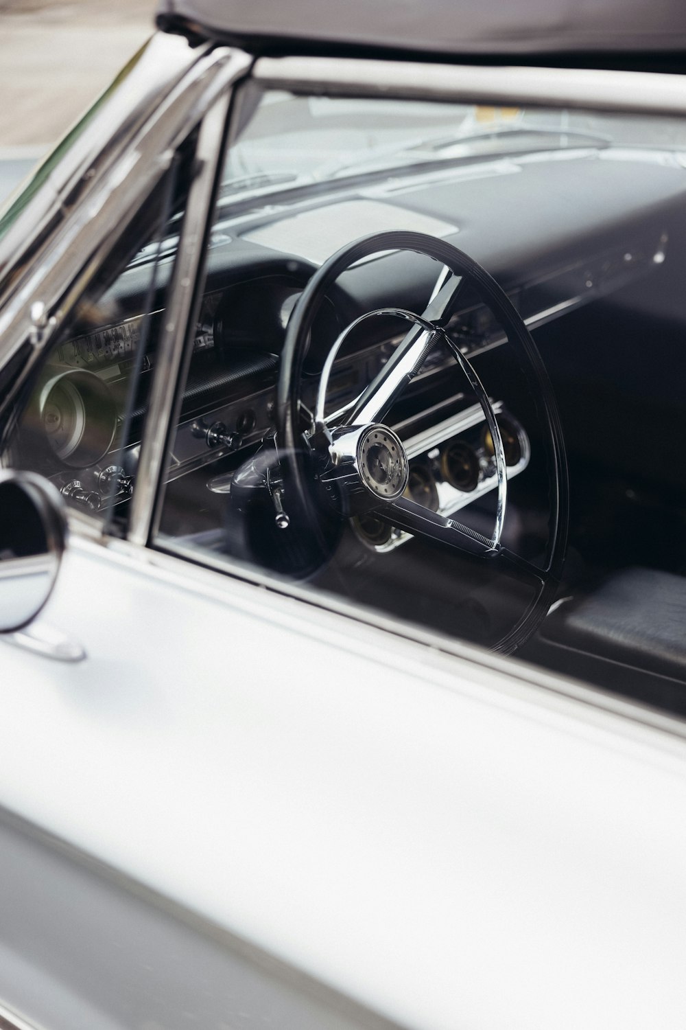 the interior of a car with a steering wheel