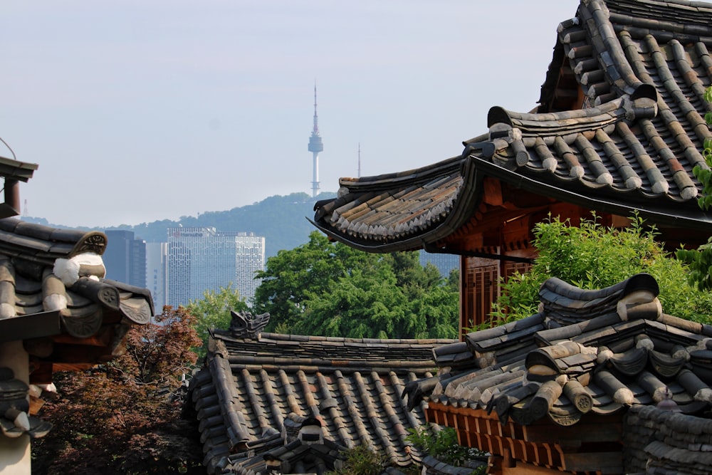 a view of a building with a mountain in the background