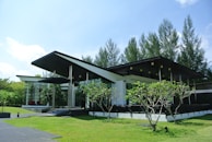 a modern house with a black and white roof