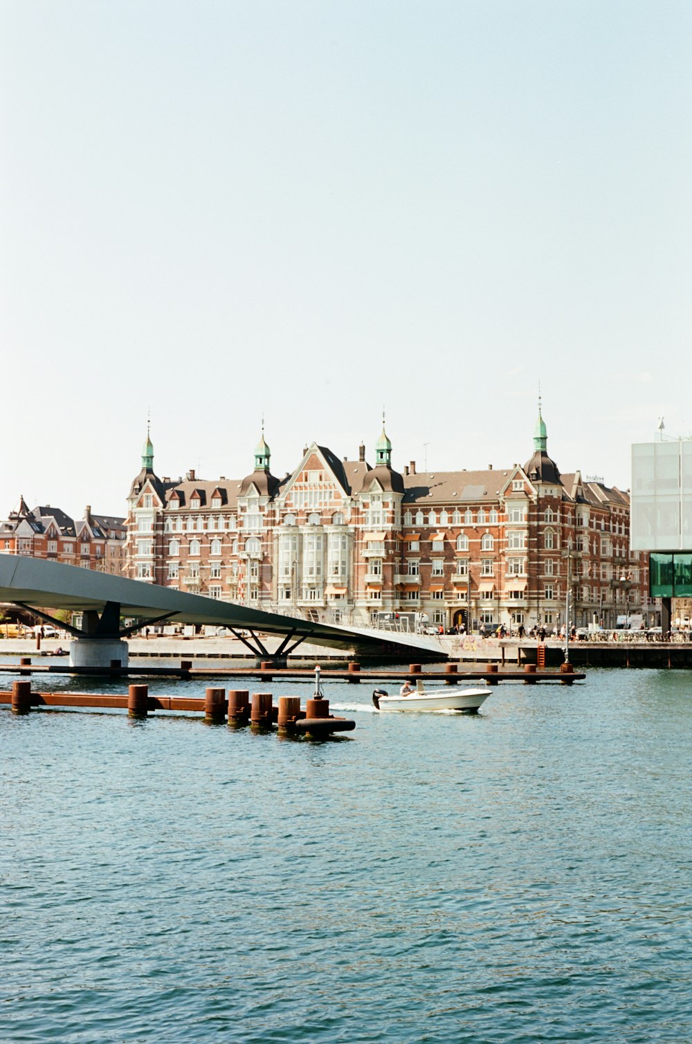 a large body of water next to a large building