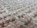 Luxurious hand-tufted carpet with rich textures displayed in a modern hotel suite.