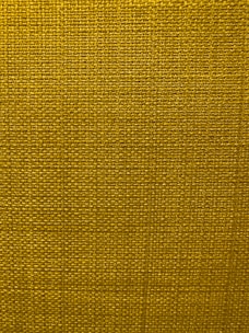 Close-up of smooth plain 1/1 cotton fabric showing fine weave texture.