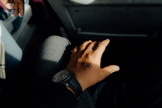 Close-up of a hand applying a super patch on the wrist with a soft glowing effect.