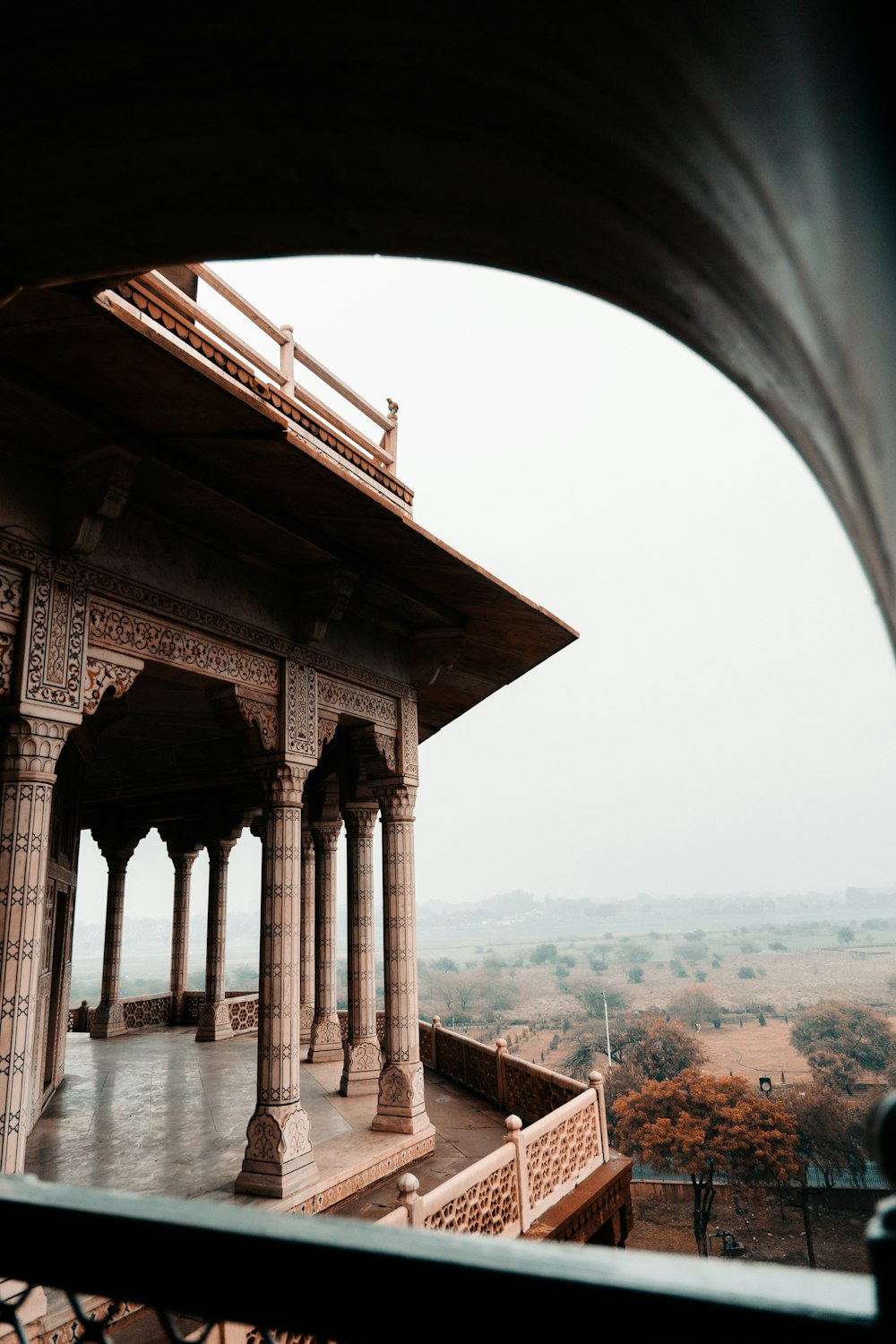 a view of a building from a balcony