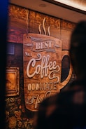 Artistic paintings adorning the walls of the coffee place.