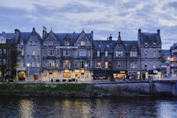 a large building next to a body of water