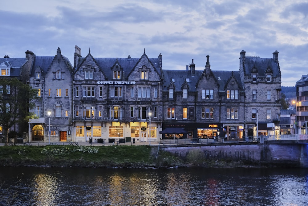 a large building next to a body of water