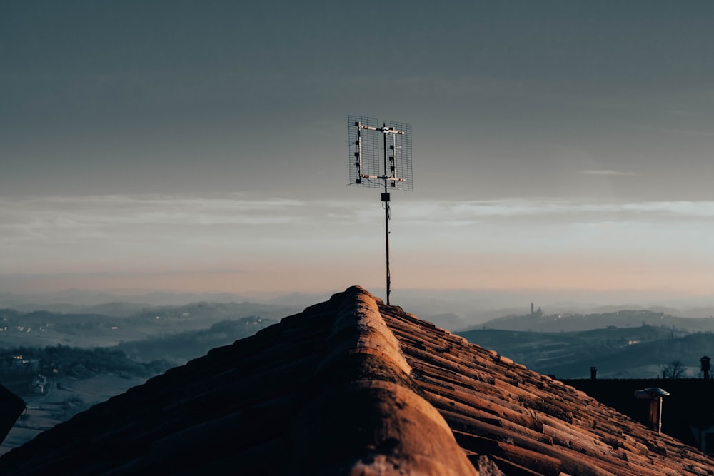 a cell phone tower on top of a roof