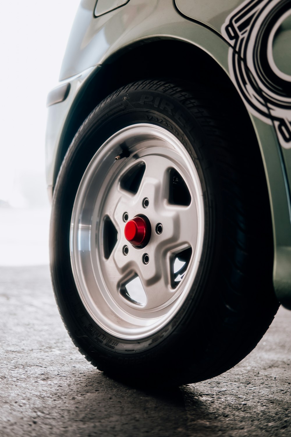 a close up of a tire on a car